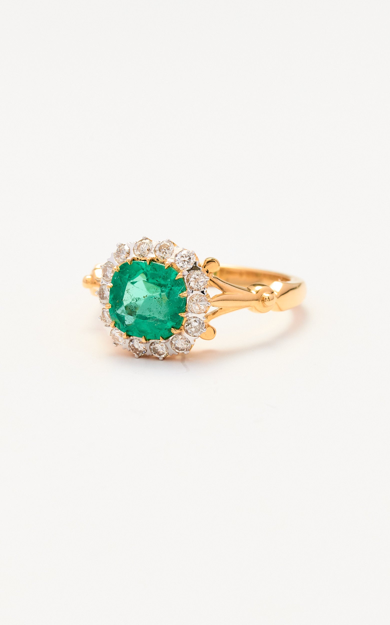 18ct gold emerald and diamond cluster ring