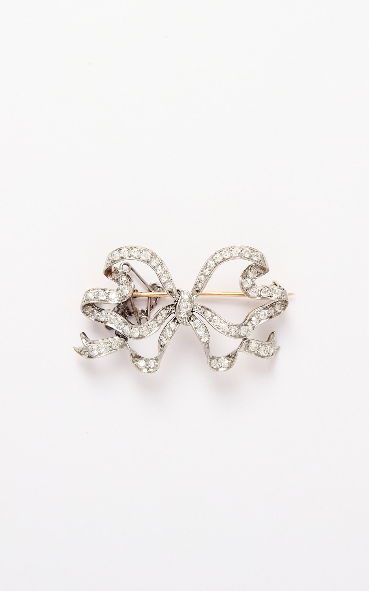 Antique 18ct gold & platinum diamond bow brooch