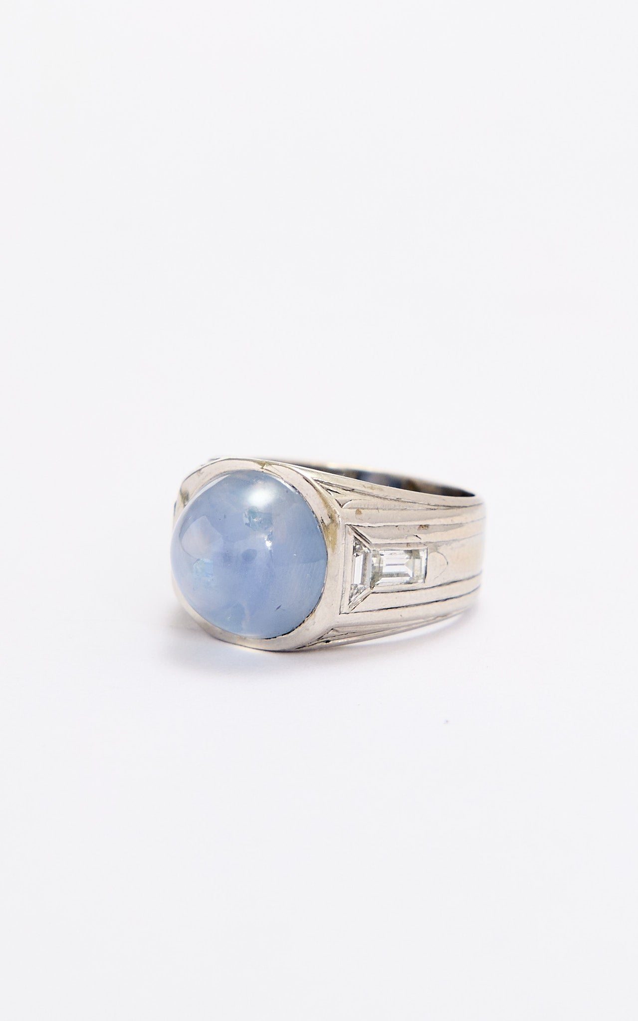 Platinum & diamond ring with a star sapphire